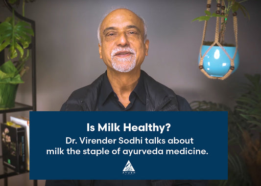 Dr. Virender Sodhi discusses the health benefits of milk in a professional setting, emphasizing its nutritional value.