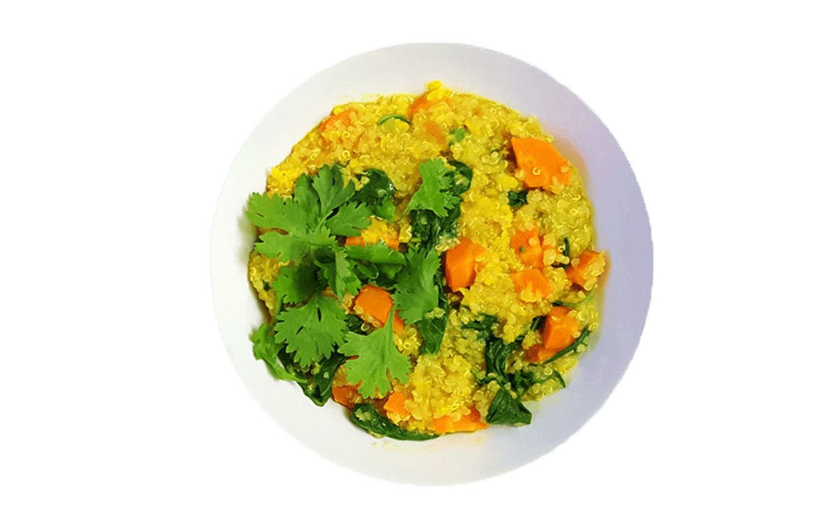 
              Yellow quinoa and vegetables in a bowl