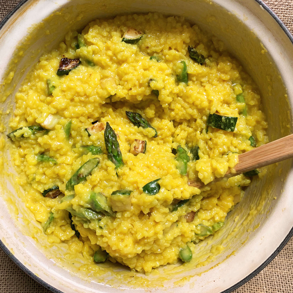 yellow safron risotto in a bowl