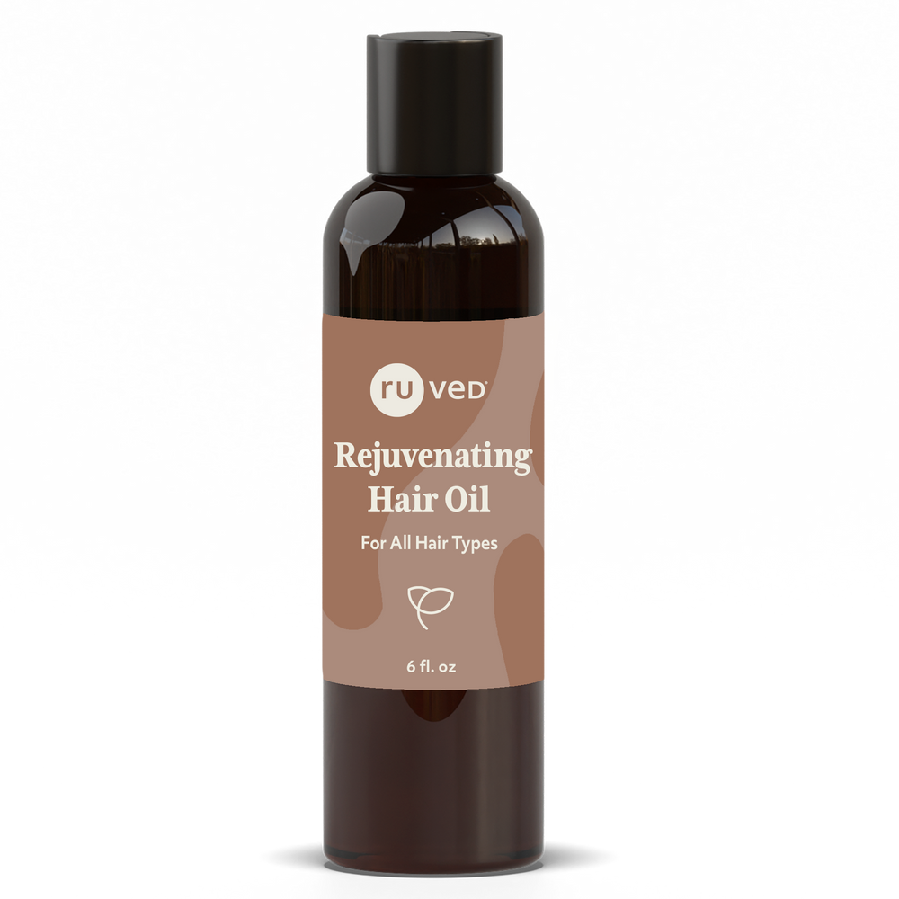 
                  
                    Rejuvenating Hair Oil bottle front by ruved herbal supplements and ayush herbs
                  
                