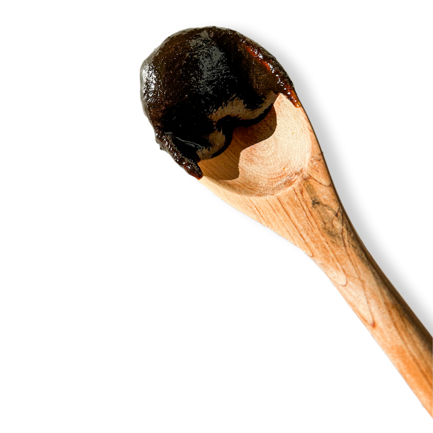 
                  
                    Amlaplex on brown wooden spoon by Ayush herbs herbal supplements
                  
                